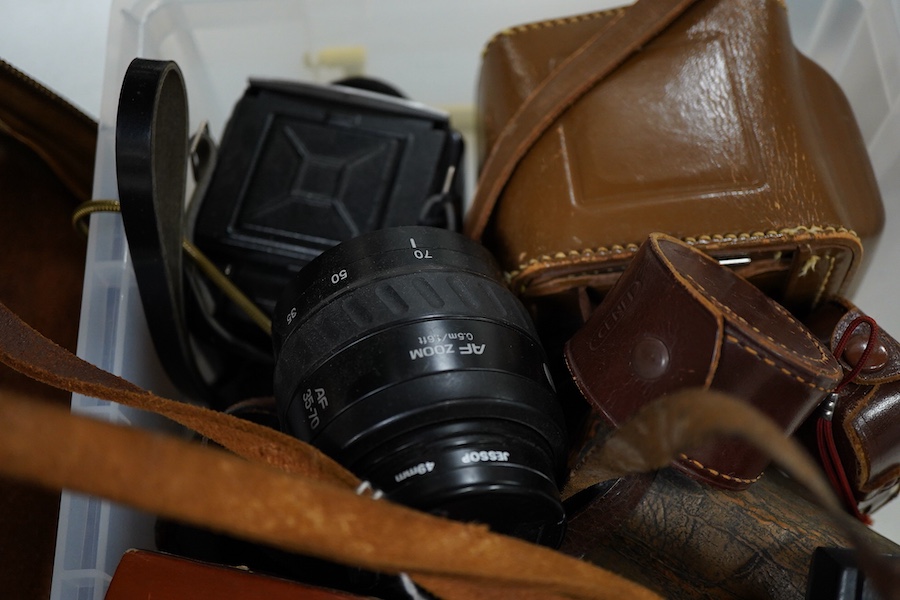 A collection of photography accessories including; two Konica lenses, a Minolta lens, a Makinon lens and a Tamron auto tele converter 2x K-EE